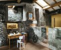 Aufenthaltsbereich einer Suite in einem Steinhaus <br>© Kulturtouristik (Hotel)